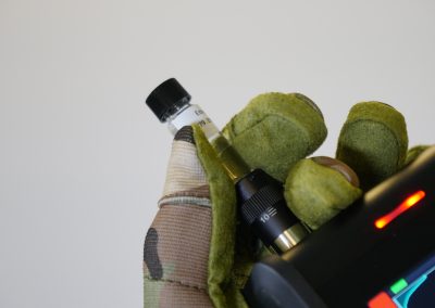 RG spectrometer with sample vial in tactical carrying pouch