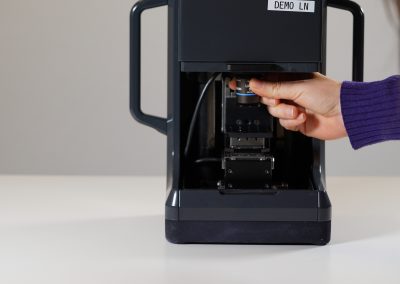 Front view of compact miniRaman microscope unit