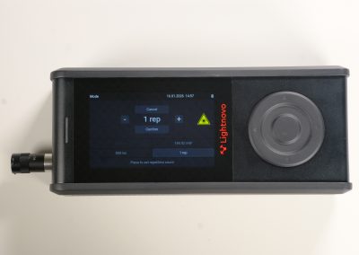 RG spectrometer touchscreen showing safety warning and measurement status