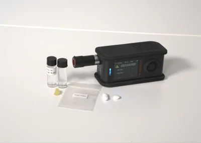 miniRaman spectrometer with sample containers and analysis accessories