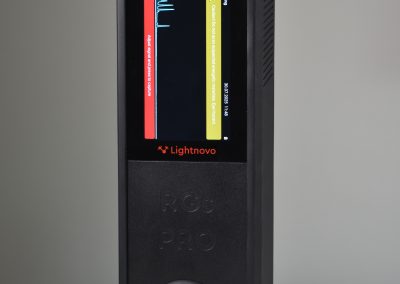 RG Pro Spectrometer portable gas analyzer with vertical touchscreen display showing real-time spectral data