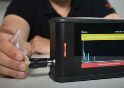 RG Pro Spectrometer handheld gas detection device being connected to sampling probe for real-time analysis